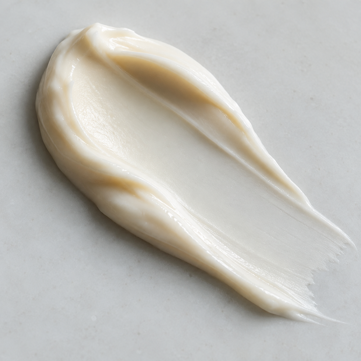 Ivory cream texture in soft window light.